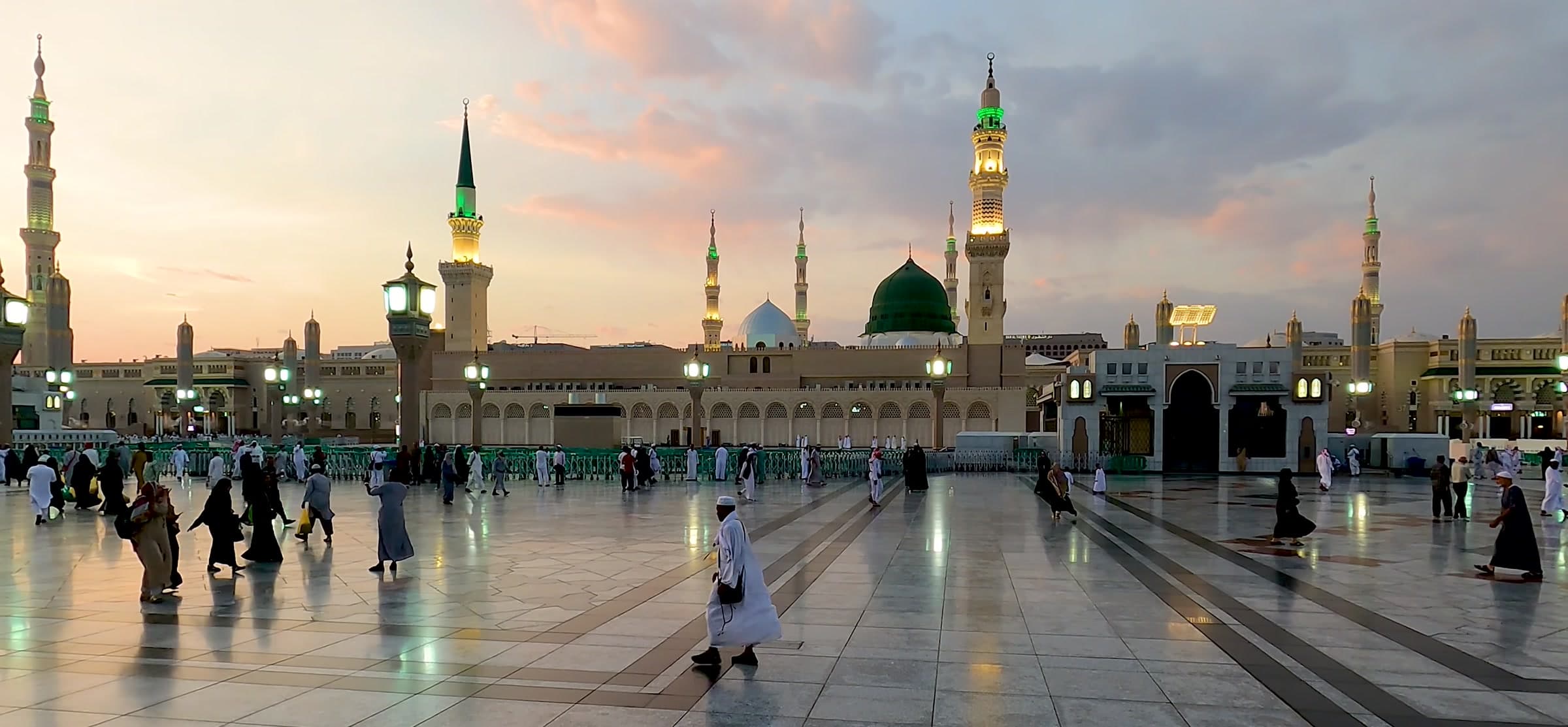 The marble plaza outside Masjid an-Nabawi at dusk.